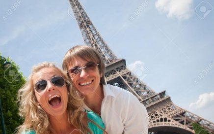 7379618-happy-young-couple-having-fun-in-paris-france-stock-photo-europe