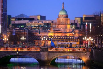 River Liffey in foreground and the Custom House dome as background pictured at dusk on April 20, 2016 in Dublin, Ireland. Illustrative picture of the Irish capital city center.